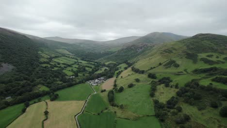 4K-Aerial-Drone-Footage-Towards-Village-In-Countryside-Rural-England-Uk