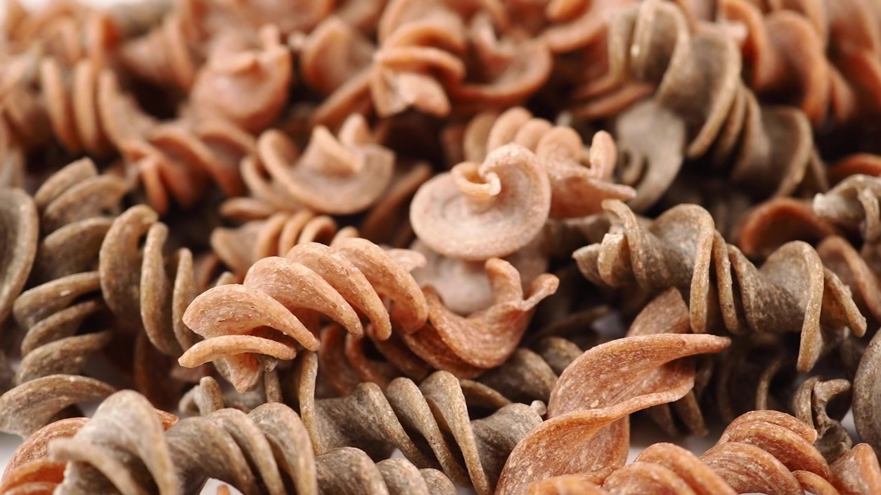 Close-up of Raw Whole Wheat Fusilli Pasta