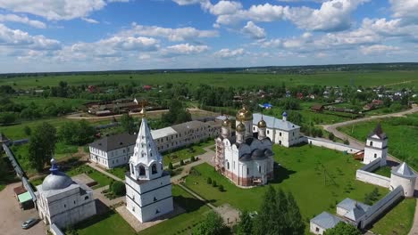 aerial view of a russian monastery and surrounding village