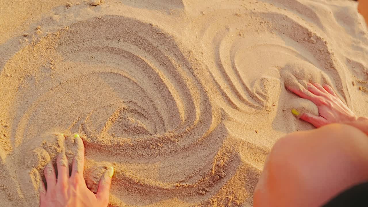 Philosophical sunset moment as woman connects with nature through the sand