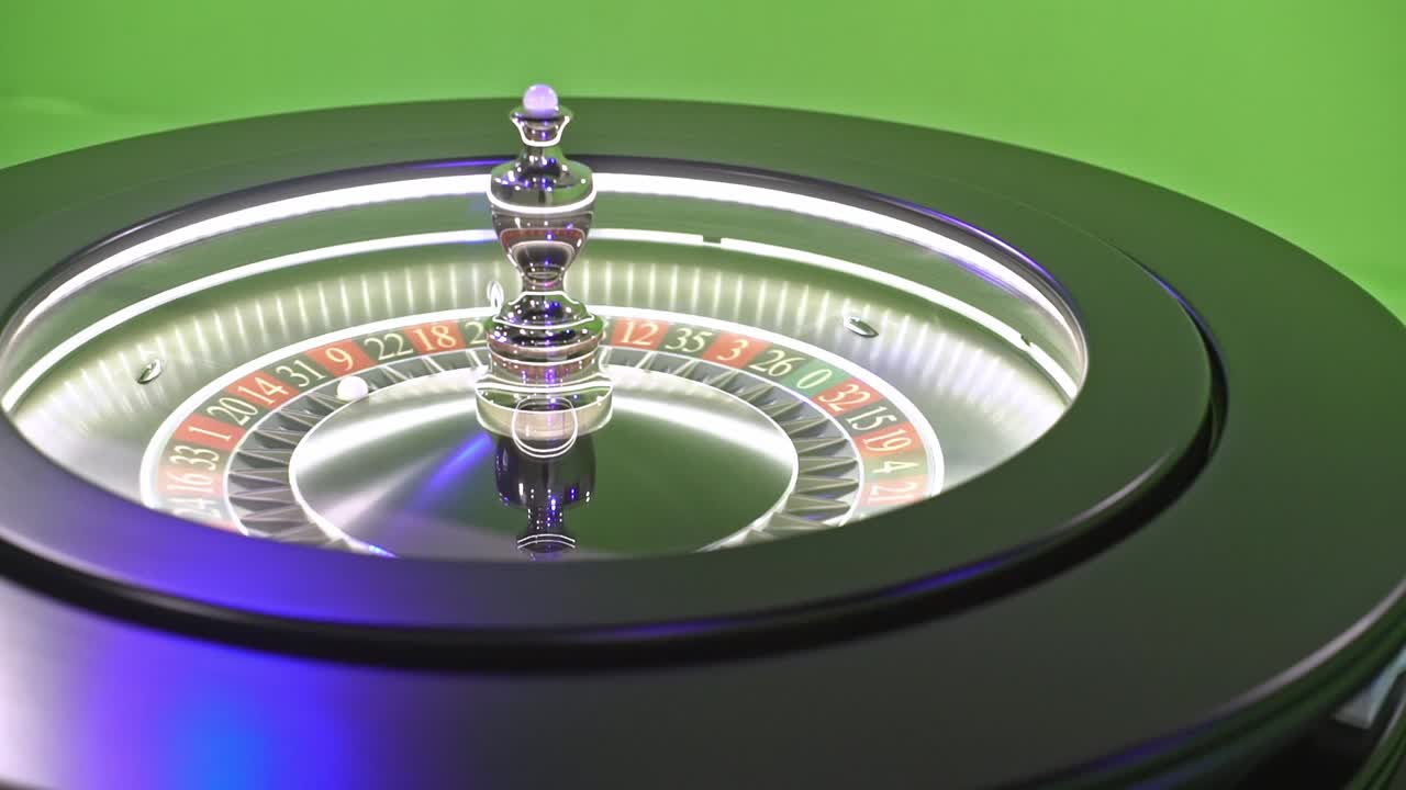 Roulette wheel spinning, ball bouncing dramatically on green screen, showcasing gambling excitement and chance of winning or losing