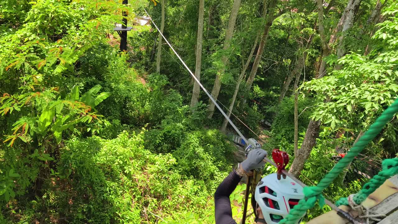 Ziplining Through Lush Forest