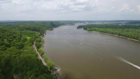 aerial hyperlapse reveals mississippi river hidden behind limestone cliffs in horseshoe bluff hiking area