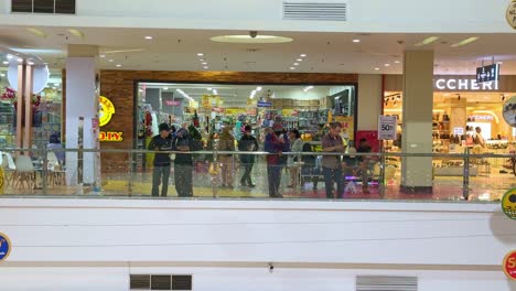 people shopping at a modern mall