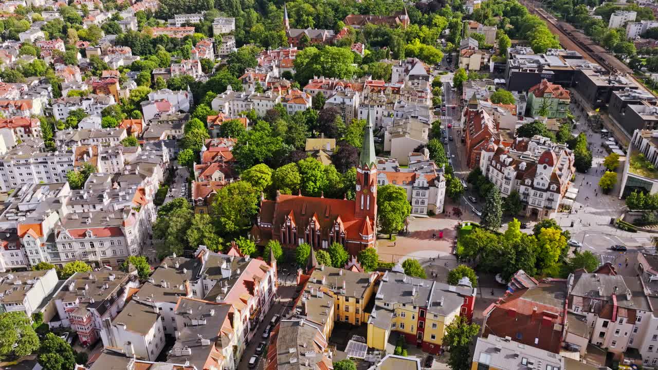 Drone view of Sopot showing Saint George church surrounded by Polish streets