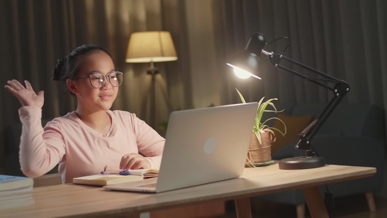 Homeschooling,Teenage Girl Learning Online From Laptop, Raising Hand Distance Learning Online At Virtual Lesson Class With Teacher Tutor On Laptop By Video Conference Call At Home