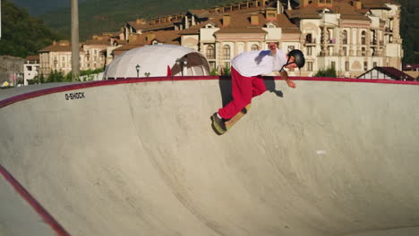 skateboarder performing tricks in a skatepark