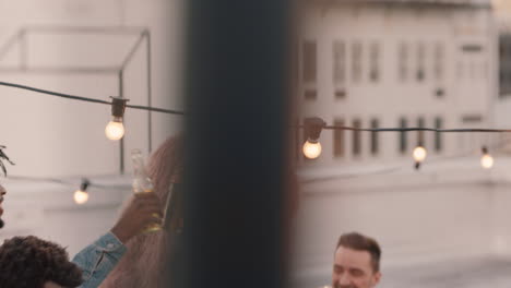 happy-rooftop-party-friends-drinking-having-fun-on-weekend-social-gathering-sitting-on-couch-chatting-enjoying-hanging-out-together-at-sunset