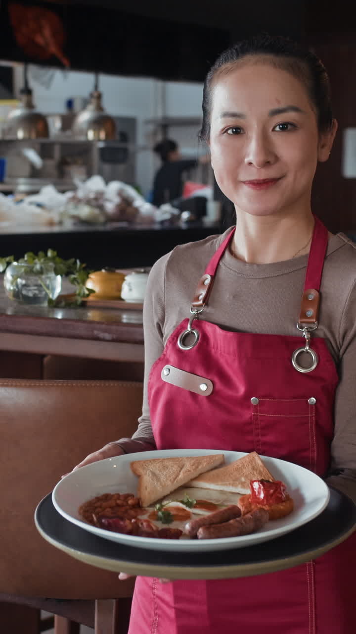 Young Waitress Holding Tray with Breakfast in Trendy Cafe