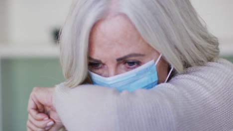 portrait of senior caucasian woman wearing face mask