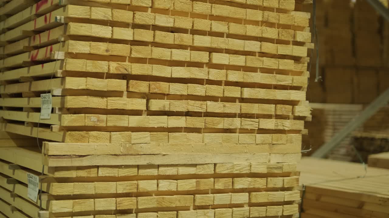 Large Stack of Wooden Planks in a Timber Warehouse