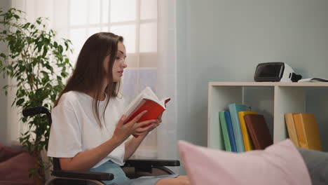 Disabled woman checks books standing on shelf in living room