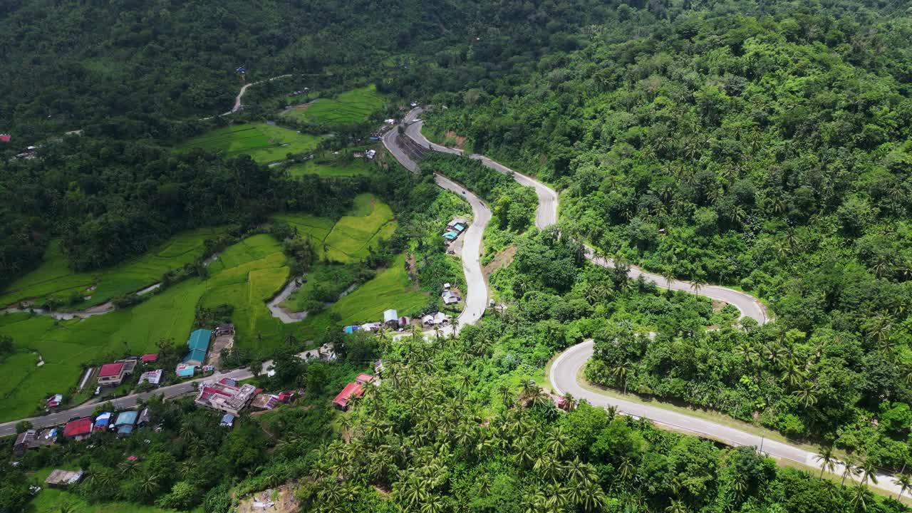 Mountainside Road To Countryside Village In Bato, Catanduanes, Philippines. Aerial Drone Shot