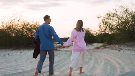 romantic couple in the sand