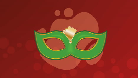 green carnival mask on red background