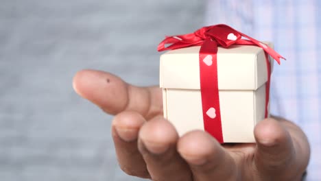 small gift box in hand