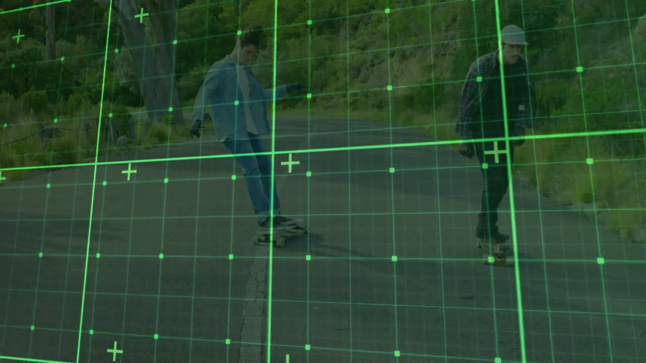 Pair of men riding skateboards downhill on rural road, showing green grid overlay for technology