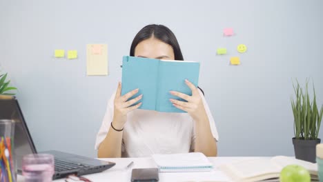 female student feeling happy and peaceful, having fun.