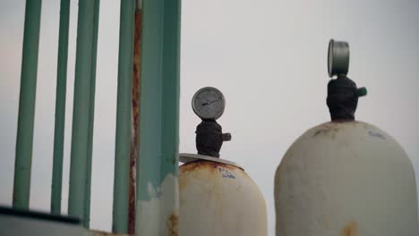 Air-and-gas-pressure-tanks-with-surface-rust-on-a-ferry