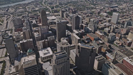 Cincinnati-Ohio-Aerial-v13-flyover-downtown-area-capturing-urban-cityscape,-waterfront-stadium,-freeway-interchange-and-views-of-Covington-KY-across-the-river---Shot-with-Inspire-3-8k---September-2023