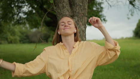 woman, headphones, dancing, summer trees