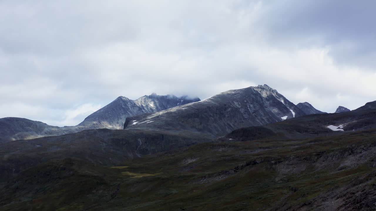 Mountain Scenery Under Cloudy Skies