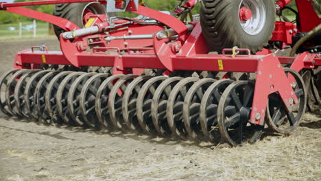 sowing machine working on agricultural field. agriculture soil. sowing seeds