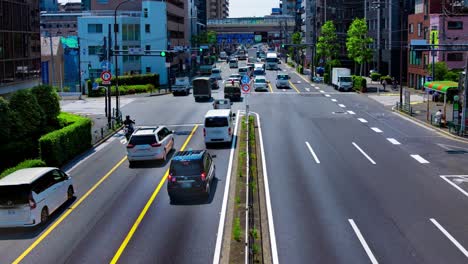 a timelapse of the traffic jam at the urban street in tokyo long shot