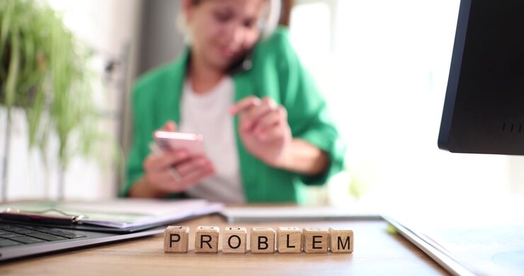 Word problem on blocks while woman multitasking with phones
