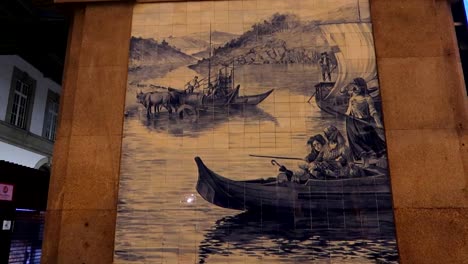 Close-up-static-shot-of-Douro-River-scene-in-tiles-at-Sao-Bento-train-station,-Porto