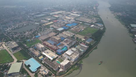 video showing the export processing zone in bangladesh polluting a river with black water