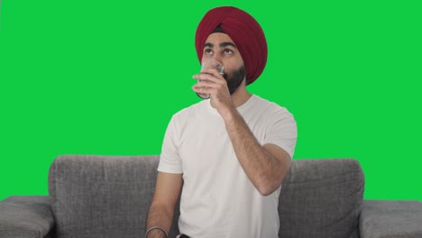 Feliz-Indio-Sikh-Hombre-Indio-Tomando-Medicina-Pantalla-Verde