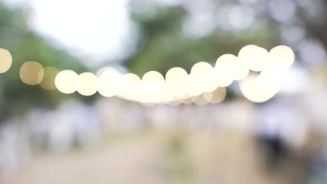 Lights-Out-Of-Focus-At-A-Wedding-Ceremony-In-A-Countryside