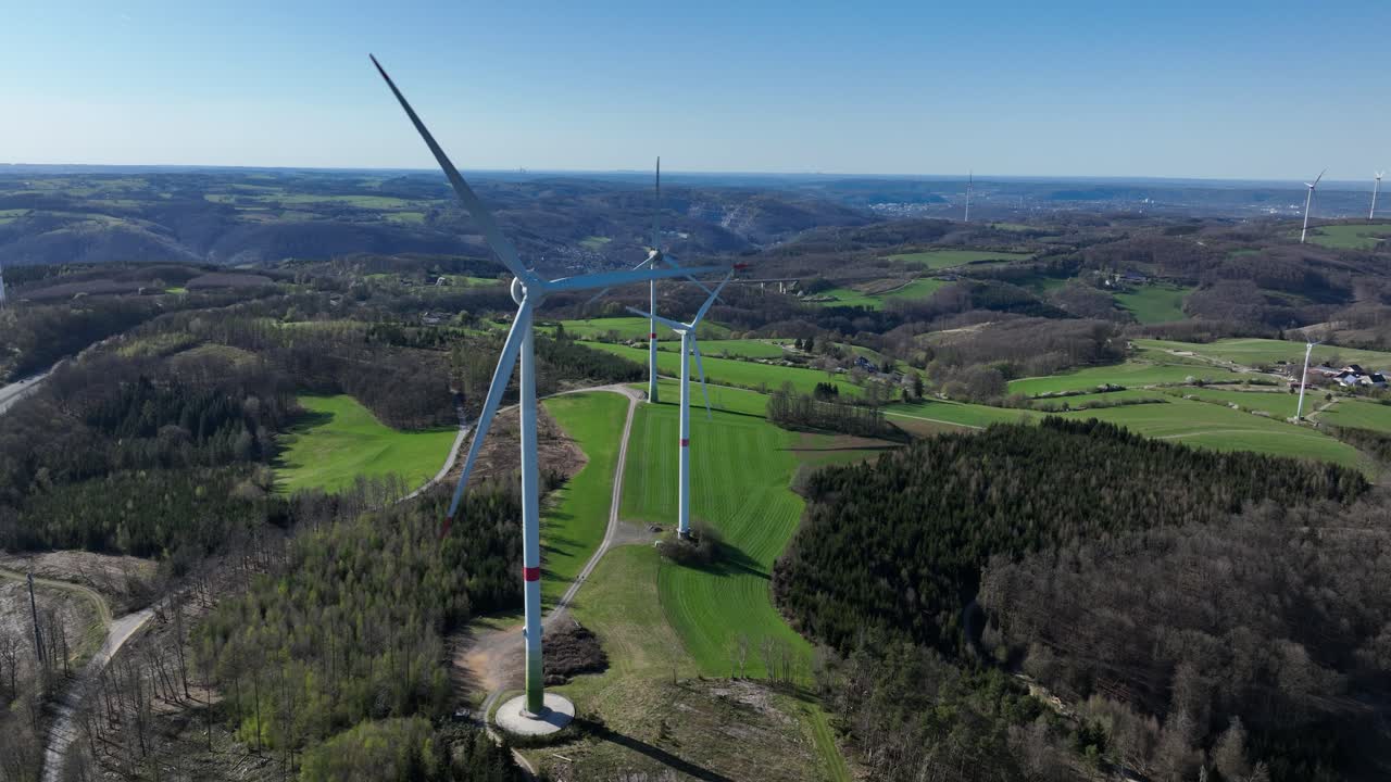 wind turbines, renewable energy, rotor blades, turning, electricity, energy, aerial drone video.
