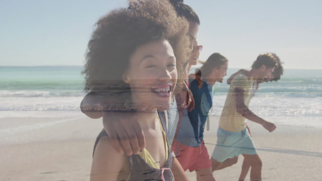Friends walking along beach promoting health campaign, showing animated heart icons above waves
