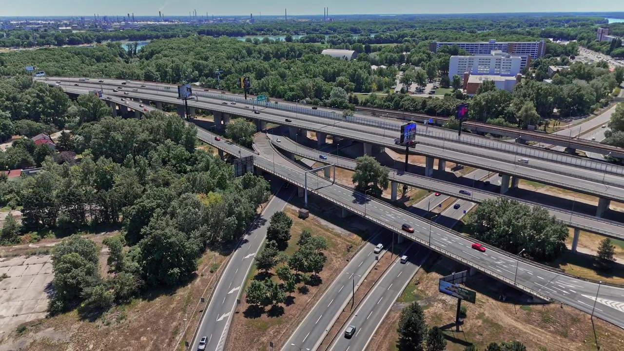 Traffic flows on highways in Bratislava, Slovakia during daytime