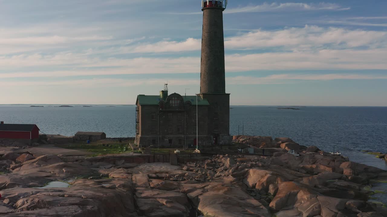 Aerial view of Bengtskär lighthouse during setting sun. The lighthouse is the tallest lighthouse in the Nordic countries and is famous for the beautiful surroundings.