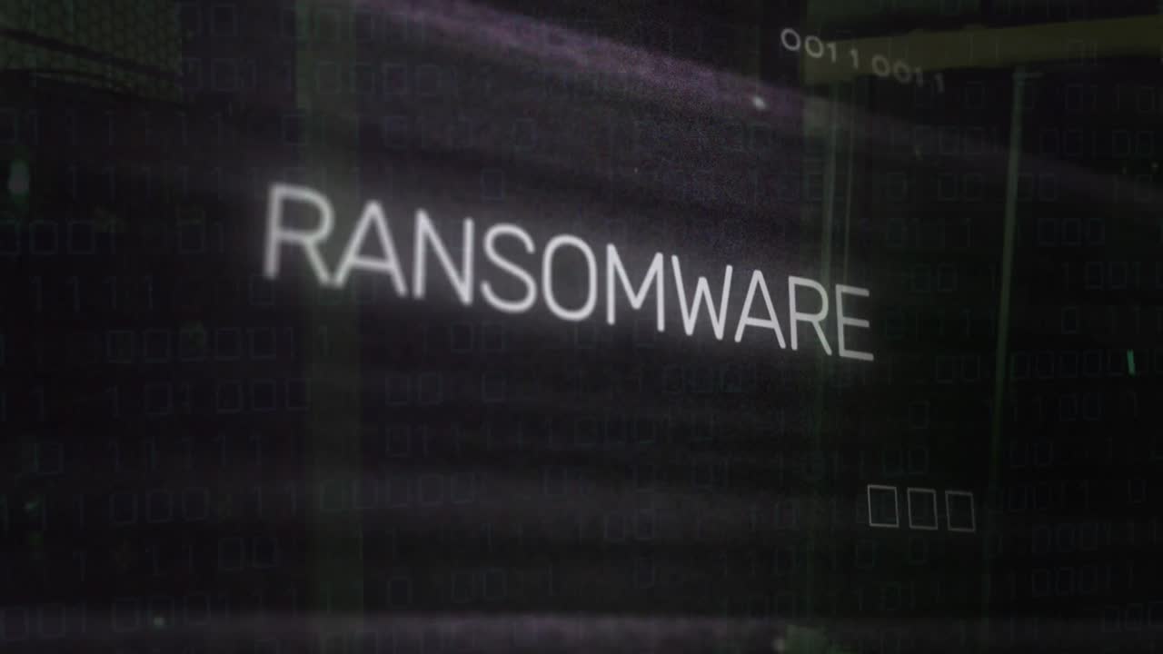 Animation of ransomware text over motherboard and data processing