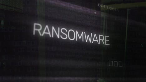 animation of ransomware text over motherboard and data processing