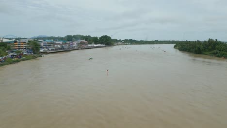 foggy morning beautiful drone view of sri aman town at batang lupar river, during regatta and pesta benak,sarawak, borneo.