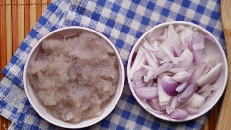 red onion in a bowl on table