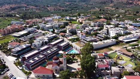 bright town center of georgioupoli in crete island, aerial view