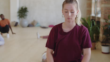 woman stretching in dance studio