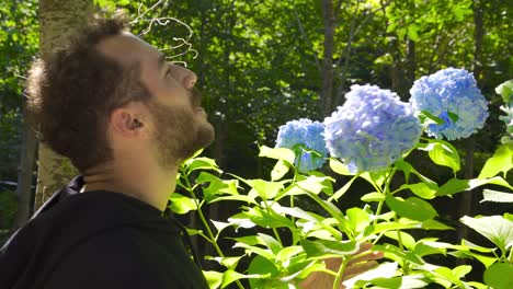 The-man-who-smells-the-flower.