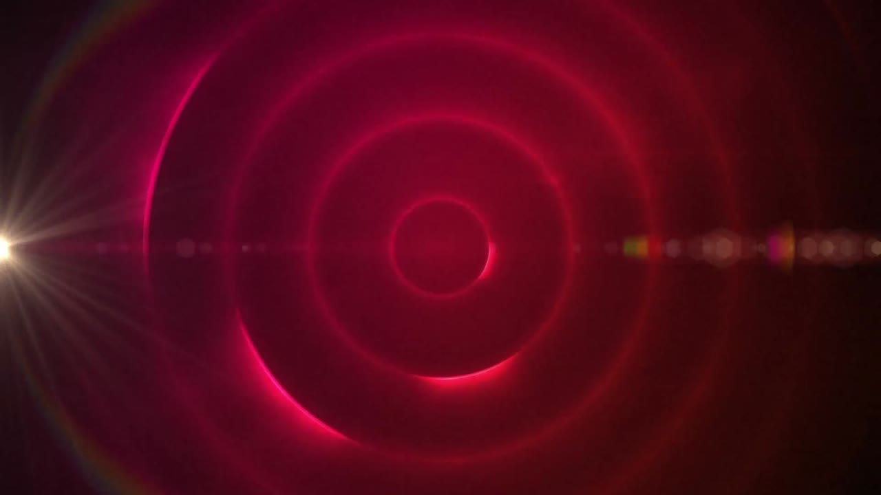animación digital del punto de luz y el destello de la lente contra rastros de luz en espiral sobre fondo rojo