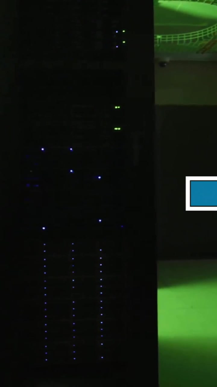 Animation of loading text and time bar over dark server room