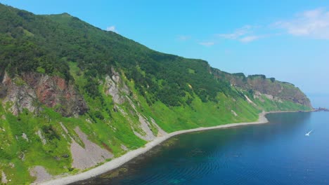 shiretoko peninsula coastal view with fishing boats