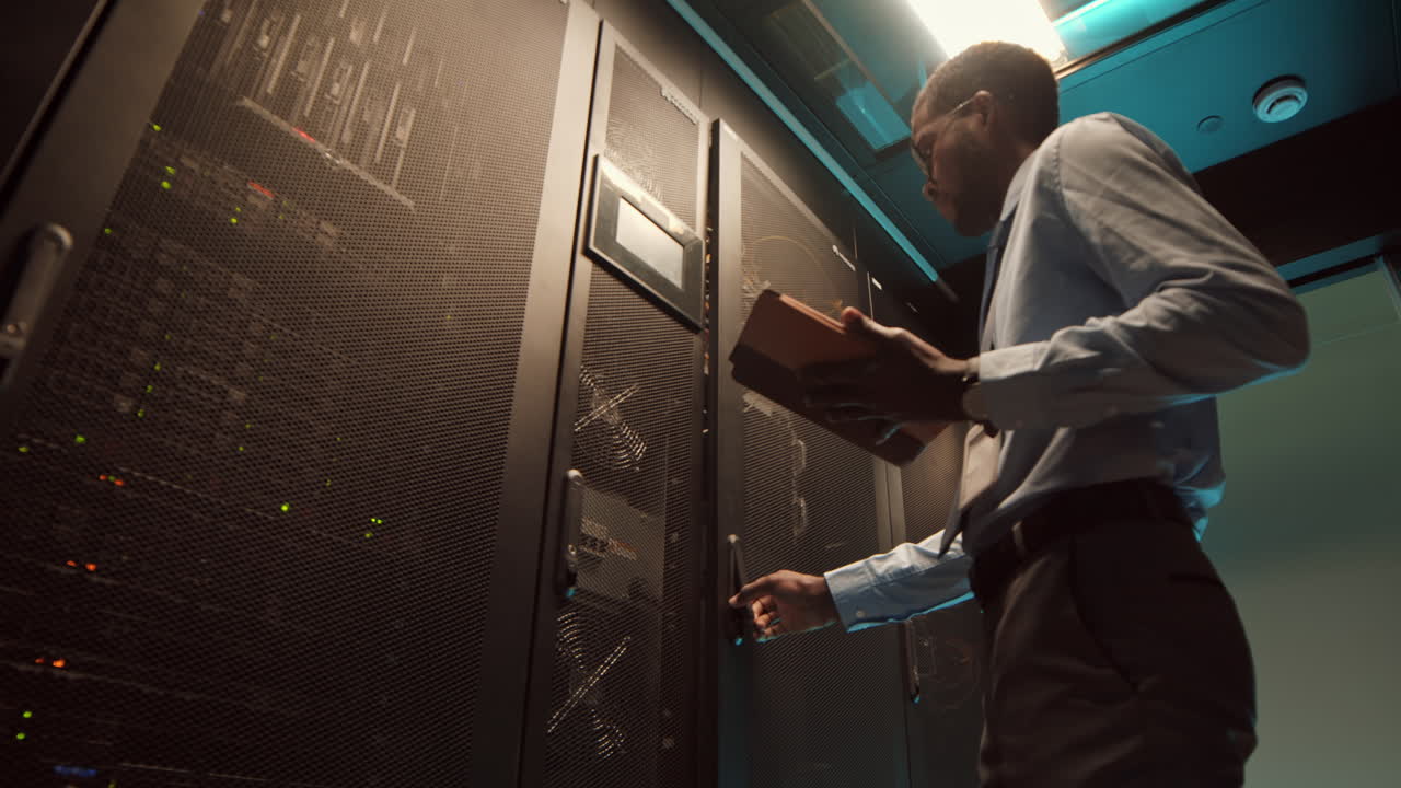 IT Technician Checking Data Center Work