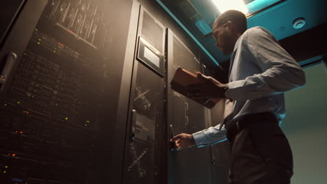 it technician checking data center work