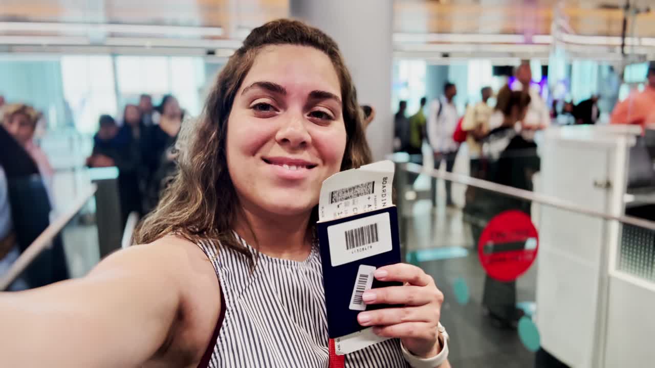 Vlogger Shares Her Travel Documents in Airport Selfie Video